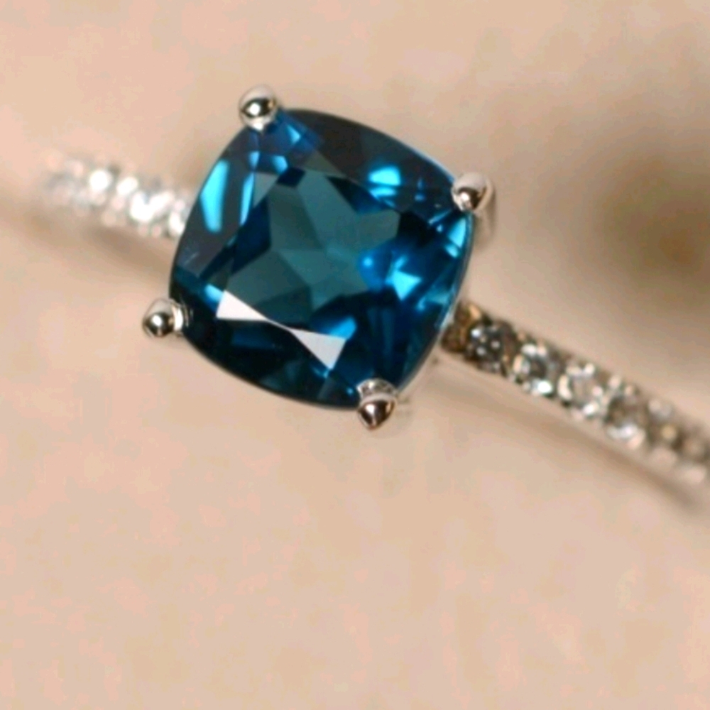 Brilliant Cut Blue Diamond Ring
